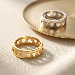 Heart band rings on gold tray