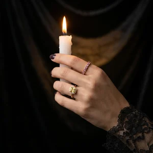 Moody candlelit jewelry display