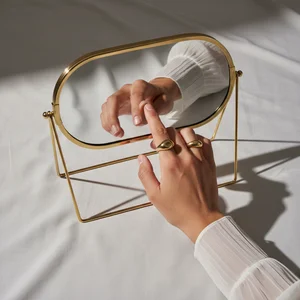 Elegant rings reflected in mirror