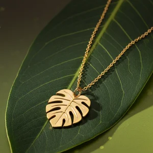 Tropical gold monstera necklace