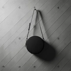 Minimalist black circular bag