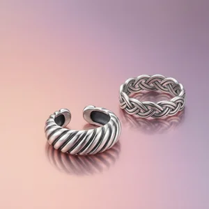 Detailed silver rings on pastel metal