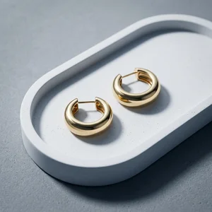 Gold hoops on concrete tray