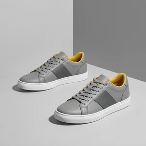 Modern grey and yellow sneakers