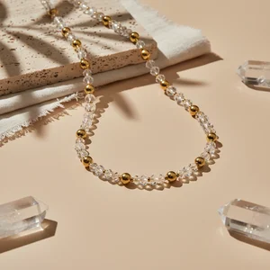 Delicate gold jewellery with crystals