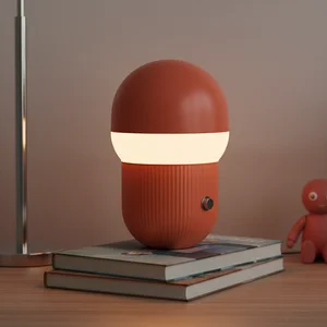 Cozy desk lamp and books