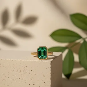 Emerald ring on cream