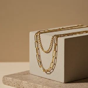 Dainty gold chain necklaces flat lay
