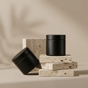 Minimalist black jars on stone