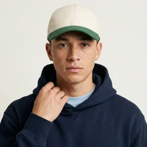 Model in casual cap and hoodie