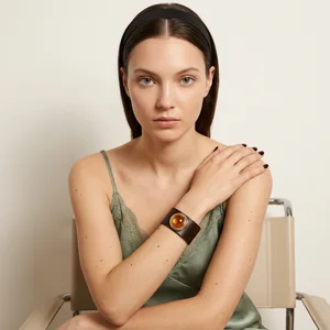 Modern model with amber cuff