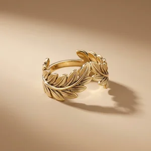 Gold leaf ring on warm beige