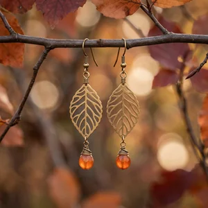 Autumn leaf earrings on branch