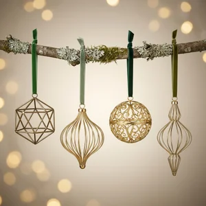 Golden ornaments on rustic branch