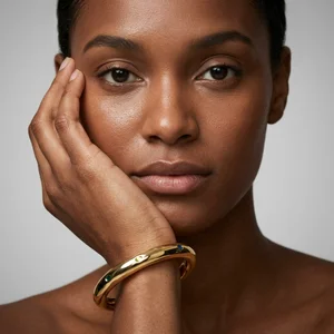 Elegant gold bangle on model