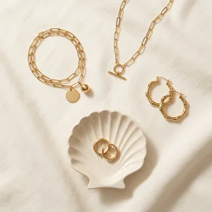 Gold jewelry on draped fabric