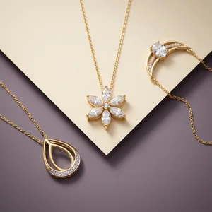 Elegant gold necklaces on paper