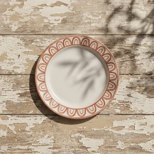 Artisanal plate on rustic wood