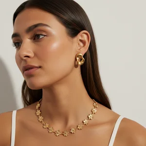 Elegant gold jewelry on model