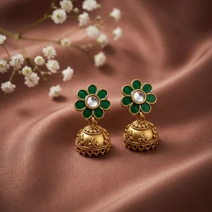 Elegant Jhumka earrings on satin