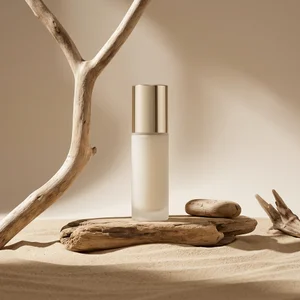 Natural skincare on driftwood and sand