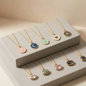 Dainty gold necklaces on neutral blocks