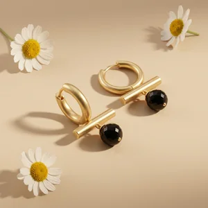 Gold earrings with leaf shadows