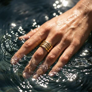 Shimmering water and gold rings