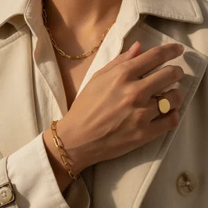 Elegant gold jewelry on hand