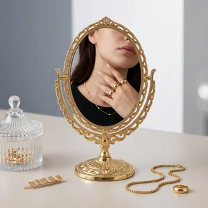Luxury jewelry reflected in gold mirror