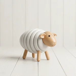 Wooden toy sheep on rustic wood