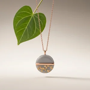 Minimalist rose gold necklace on leaf