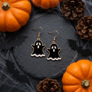 Spooky ghost earrings flat lay