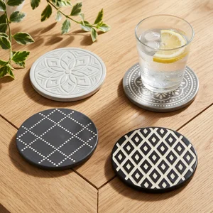 Mandala coasters on rustic wood