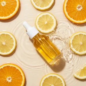 Citrus serum in water splash