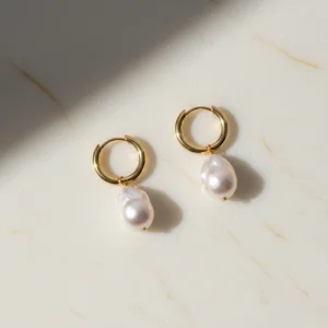 Baroque pearl earrings on fur