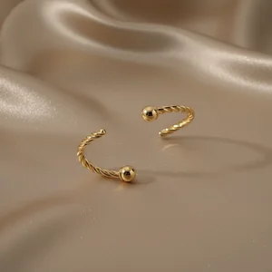 Elegant golden bangle on silk