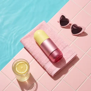 Playful summer poolside flat lay