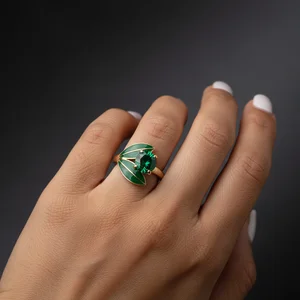 Elegant gold ring with green stone
