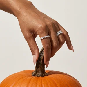 Autumn diamond rings on pumpkin stem
