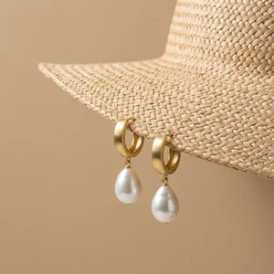 Summer pearl hoops on straw hat