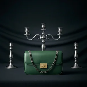 Elegant handbag on dark fabric