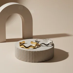 Golden bracelets on ceramic art