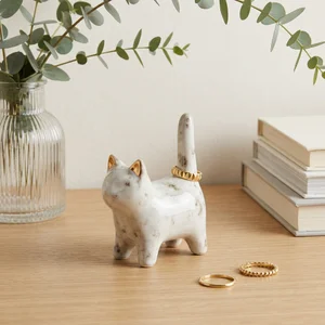 Marble cat ring holder on wood
