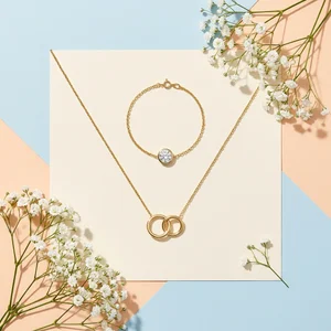 Modern gold jewelry flat lay