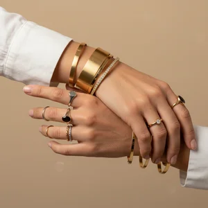 Elegant gold bracelets & rings