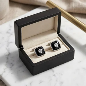 Elegant diamond cufflinks on marble