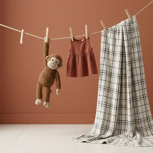 Playful baby items on clothesline