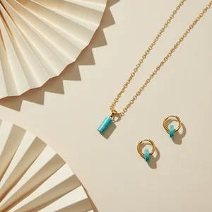 Artistic gold jewellery arrangement