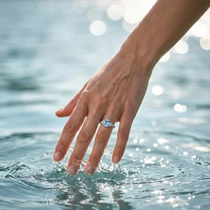Sparkling hand with aquamarine ring